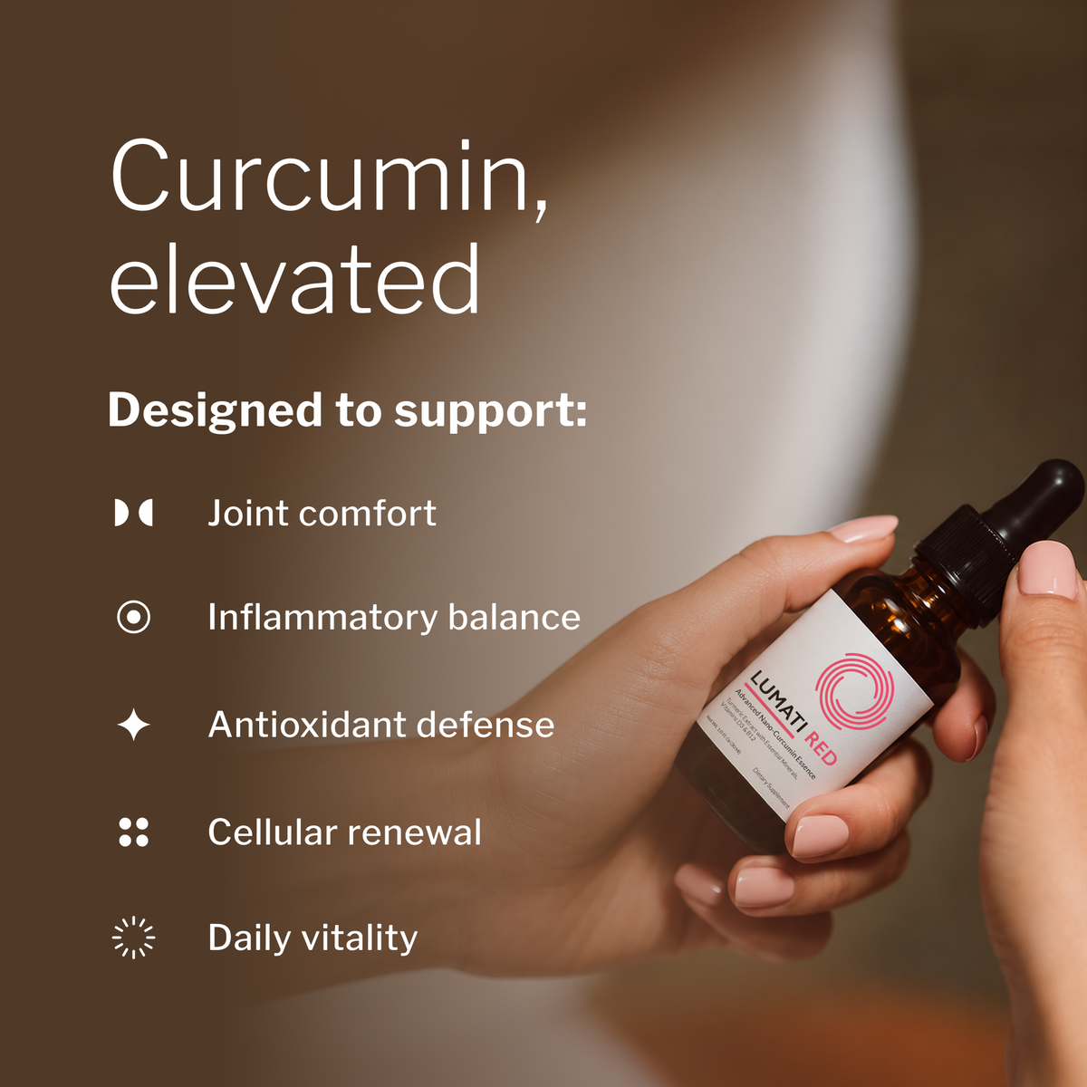 Hand holding Lumati Red bottle; designed to support joint comfort, antioxidant defense and daily vitality